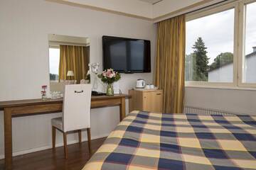 Фото номера Улучшенный двухместный номер с 1 кроватью Отель Hotel Adlon г. Мариехамн 3